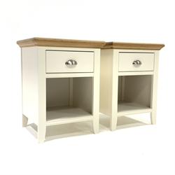 Pair of contemporary oak and cream finish bedside tables, each fitted with drawer and open shelf, W47cm, H61cm, D43cm