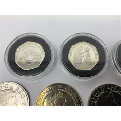 Seven Queen Elizabeth II UK five pound coins, nine old style two pound coins, two Bailiwick of Jersey 2003 silver fifty pence coins and Alderney 2003 silver fifty pence coin