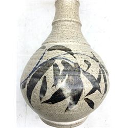 Robert Tinnyunt (Burmese 1940-): Stoneware bottle-shaped vase with bamboo effect neck, brush decoration on speckled oatmeal ground, H39cm 