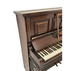 John Grey & Son of York and Hull - mid 20th-century upright overstrung iron framed piano with an under damper action, in a mahogany case with three front panels and a folding music desk, serial No 5641, original stringing, hammers and dampers.