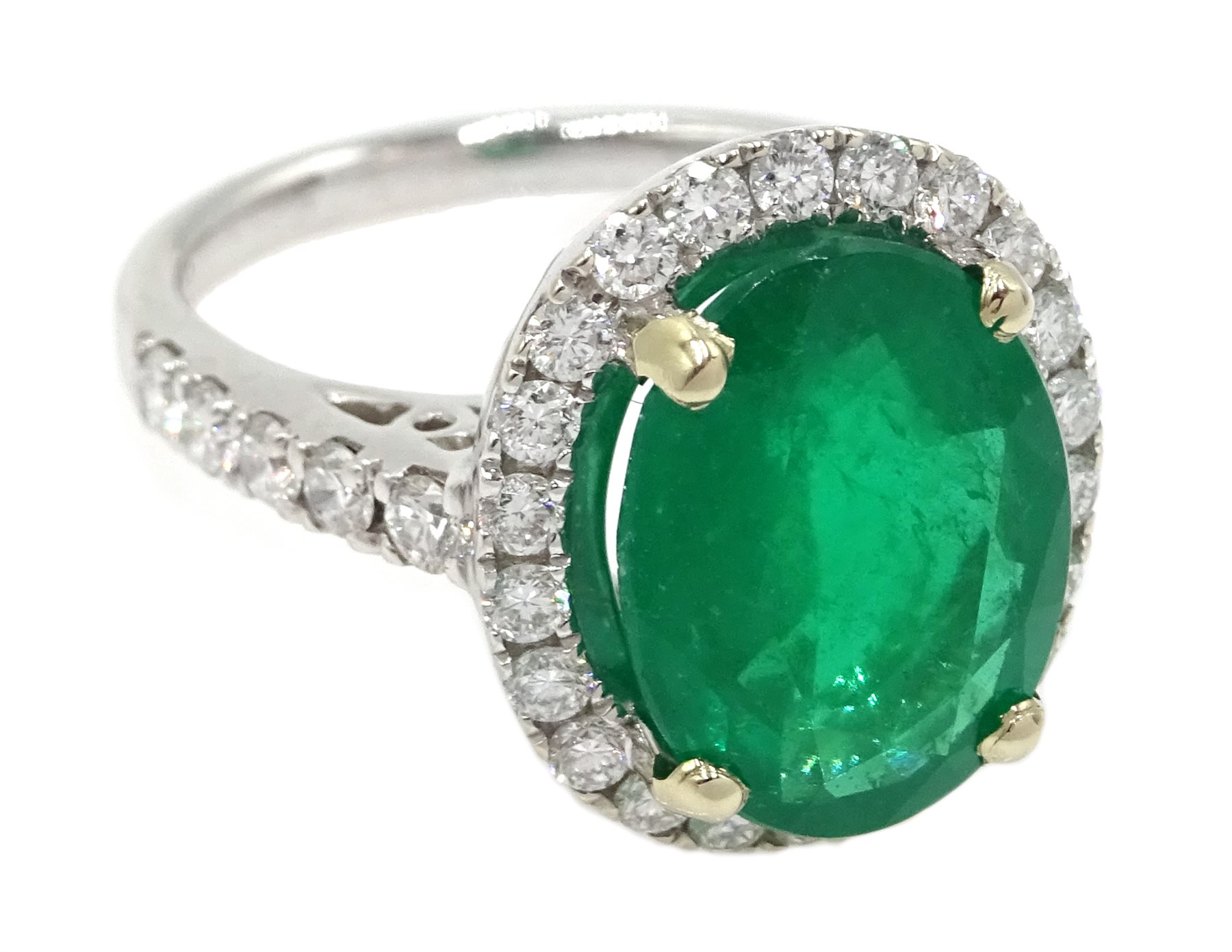 DS 18ct white gold oval emerald and diamond ring, with diamond set ...