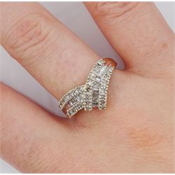 10ct gold baguette and round brilliant cut diamond wishbone ring, stamped