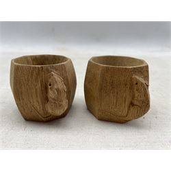 Pair of 'Mouseman' oak napkin rings with carved mouse signature, by Robert Thompson of Kilburn, H5cm (2)