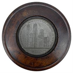 19th century circular turned oak box, the lid inset with a medallion, one side with a view of York Minster and inscribed 'The South West Tower Bells Clock & Nave Destroyed By Fire 1840' titled and dated 1829 and the reverse 'The Choir of York Minster Destroyed by Fire 1829, the interior carved with the crossed keys arms of the archbishop of York, D9cm 