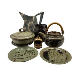 Quantity of studio pottery including, Rosamund Burnett plates decorated with female figures, Crowan pottery teapot with cane handle, Nic Harrison tureen, Isabel Denyer jug together with a large angular jug etc max H28cm (7)