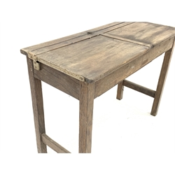  19th century oak school desk, top set with inkwells and two hinged compartments, raised on square supports, W102cm  