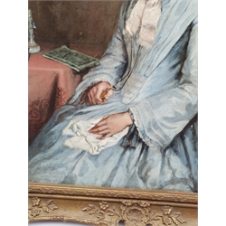 English School (19th century): Girl at a Desk Clutching a Locket, oil on canvas unsigned 52cm x 42cm