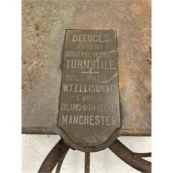 A cast iron rush preventative turnstile, by Ellison & Co., Manchester, from York City football ground, Bootham Crescent , painted green with maker's stamp and crowed counter with brass plate with serial number H103cm, W110cm, D100cm 