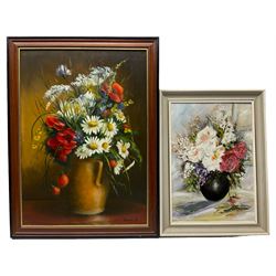 Simon Bela (Continental 20th century): Still Life of Wild Flowers in a Vase, oil on board signed 48cm x 34cm; Continental School (20th century): Still Life of Roses in a Vase, oil on board indistinctly signed 34cm x 24cm (2)