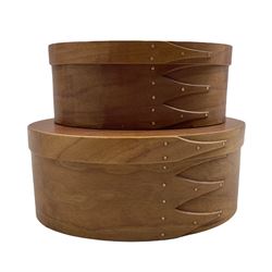 Pair of graduated bentwood Shaker style oval boxes by Orleans Carpenters, each with swallowtail joints and copper tacks, L21.5cm max
