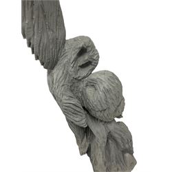 Wooden chainsaw carving of a pair of Owls, in grey-blue finish