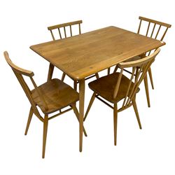 Ercol - mid-20th century elm and beech dining table, rectangular top over undertier, on splayed supports; together with set four ercol beech and elm dining chairs 
