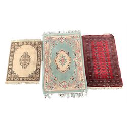 Persian design ground rug, ivory field with border, (140cm x 96cm) Bokhara design ground rug (170cm x 95cm) Chinese washed wool ground rug (210cm x 120cm), dressing table mirrors, 
French style upholstered beech framed open armchair, mahogany plant stand and a TV stand