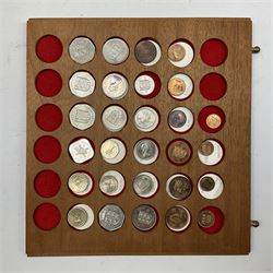 Fourteen drawer coin cabinet containing mostly Channel Islands and Isle of Man coinage including nineteen Bailiwick of Jersey silver one pound coins, Queen Victoria States of Jersey one thirteenth of a shilling coins 1866, 1870 and 1871, various Guernsey (Guernesey) one double, two doubles, four doubles and eight doubles coins, two Jersey Guernsey and Alderney 1813 one penny tokens, Isle of Man Queen Elizabeth II crown coins including 1976 'Centenary of the Horse Tram', 1979 'Tercentenary of Manx Coinage' etc some being in silver, 1980 Christmas fifty pence etc 