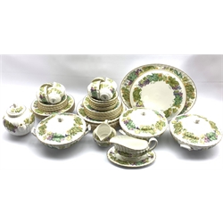 Royal Worcester 'Vine Harvest' pattern table service comprising eight dinner plates, eight dessert plates, six soup bowls, three vegetable dishes and covers, eight cups and saucers, eight tea plates, tea pot milk jug, sugar bowl, sauce boat and stand, oval meat plate and a gateau plate (64) 