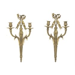 Pair late 20th Century gilt metal wall sconces, ruffled ribbon pediment on tapering husk stop fluted stem, two out splayed and serpentine acanthus cast and reeded branches, H55cm x D17cm x W28cm