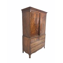 Georgian mahogany linen press, converted for use as a drinks cupboard, geometric inlay to cornice over plain frieze and two well figured doors enclosing three shaped shelves, two short and two long graduated drawers under, raised on splayed bracket supports W126cm, H204cm, D57cm