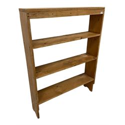 Pine bookcase, fitted with three shelves