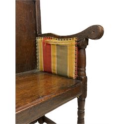 17th century oak Wainscot armchair, moulded frame and panelled back, shaped arms over upholstered sides, on turned front supports united by plain stretchers