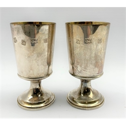Pair of silver limited edition goblets with gilded interiors commemorating the thirteen hundredth anniversary of Ripon Cathedral H13cm Nos. 131 & 132/1300 9.6oz with certificates