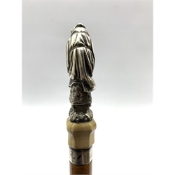 19th century Malacca walking cane, the white metal finial modelled as a Anthropomorphic Fox dressed as a Monk complete Cowl and rosary, signed W. Wolff. F. possibly after Wolff, Friedrich Wilhelm (German 1816-1887), the Malacca shaft with pierced with hole for wrist loop, white metal collar and ivory mounts, L88.5cm