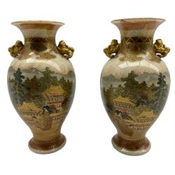 Pair Japanese Satsuma porcelain vases, of ovoid shape with twin lion formed handles featuring decoration of pavilions  H15cm