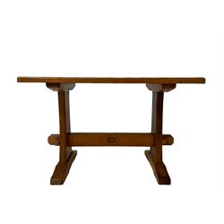 Acornman - rectangular adzed oak coffee table, shaped supports on sledge feet joined by pegged stretcher, by Alan Grainger of Brandsby, York