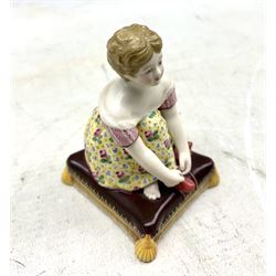 Minton porcelain figure of a girl tying her shoe lace, unmarked H9.5cm, 
