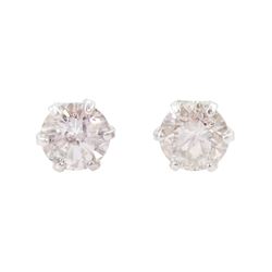 Pair of 18ct white gold round brilliant cut diamond stud earrings, total diamond weight approx 0.20 carat
