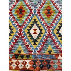 Chobi Kilim multi-ground rug, the field decorated with concentric lozenges with contrasting colours and ivory outlines, the guarded border with repeating geometric motifs