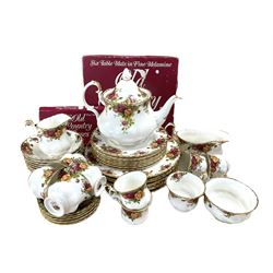 Royal Albert Old Country Roses dinner and tea service comprising eight dinner plates, eight side plates, teapot, five teacups and saucers, milk jug, sugar bowl, four coffee cups and two saucers, eight bowls, set of six boxed table mats and coasters 