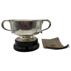 Edwardian silver two handled trophy 'Badsworth Hunt Point to Point presented by Mr Hope Barton' D20cm on wooden base London 1904 Maker Skinner & Co and a copy of The Badsworth by William Scarth-Dixon 