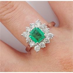 18ct gold emerald and round brilliant cut diamond cluster ring, hallmarked, emerald approx 1.10 carat, total diamond weight approx 0.90 carat