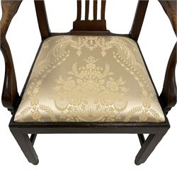 Georgian elm open armchair, the shaped cresting rail over pierced interlaced splat, curved arms and supports, drop-in seat cushion upholstered in floral silk fabric, on square supports with inner chamfer united by plain stretchers 
Provenance: From the Estate of the late Dowager Lady St Oswald