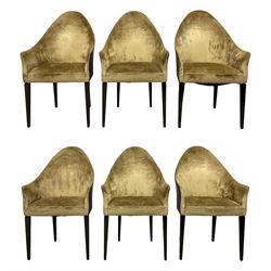 Diana Zabarella for Reflex Angelo - set six 'Peggy' dining chairs, the arched back and arms over padded seat upholstered in gold fabric, the exterior in a black faux leather, raised on square tapering ebonised supports