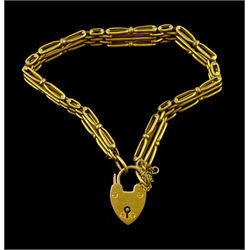 Early 20th century gold three bar link gate bracelet, with heart locket clasp, stamped 9ct