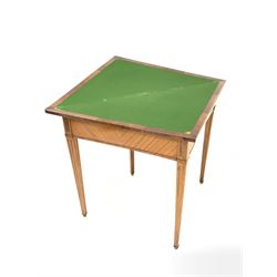 Crossbanded satinwood card table of triangular form with baize lined interior on square tapering supports W102cm