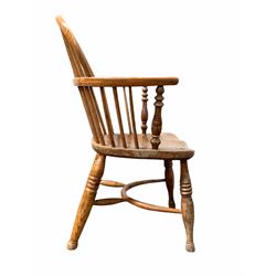 19th century elm and yew Windsor chair, double hoop spindle and splat back over saddle seat, raised on turned supports united by crinoline stretcher 