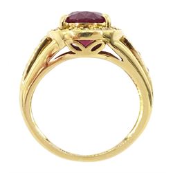18ct gold oval cut ruby and round brilliant cut diamond cluster ring, with diamond set shoulders, Sheffield 2012, ruby approx 3.55 carat, total diamond weight approx 0.30 carat