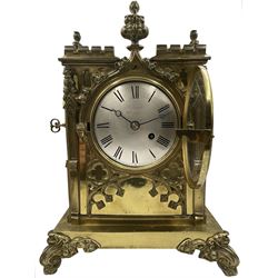 John  Knight Saunders of Warminster - mid nineteenth century 8-day fusee bracket clock in a brass gothic inspired case decorated with crenelations, crockets, pinnacles, tracery and other features typically used to embellish gothic churches and buildings, with a silvered convex dial engraved with the makers name, Roman numerals and steel moon hands within a cast brass bezel and conforming convex glass, single train timepiece fusee movement. With pendulum and key.
Clock cases such as this reflect the mid Victorian gothic revival period championed by the Victorian architects Augustus Pugin, George Gilbert Scott and Charles Barry. Greatly inspired by the building of the New Houses of Parliament and other public buildings erected at the time in the revived gothic style. 
John Knight Saunders is recorded as working in Warminster (Wiltshire) 1833-1844.
A most interesting record of this clockmakers short life is given in 