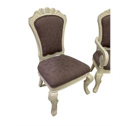 Pair French style painted open armchairs, the scalloped cresting rail over upholstered backs and seats with scrolled arms and cabriole supports; with pair matching side chairs 