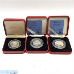 Queen Elizabeth II 1997, 1998 and 1999 Isle of Man silver proof Christmas fifty pence coins, all cased with certificates
