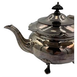 Silver teapot with shaped rim, fluted spout and raised on pad feet, with an ebonised handle and finial, hallmarked Charles Edward Nixon, Sheffield 1903, H15cm