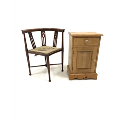 Pine bedside cabinet with one drawer over panelled cupboard, shaped plinth base, (W43cm) together with an Edwardian beech corner chair, with needlework upholstered seat panel, (W60cm)
