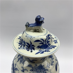 19th century Chinese baluster vase, decorated in underglaze blue with scrolling dragon and foliage, domed cover with Dog of Fo finial, Kangxi four character mark H32cm 