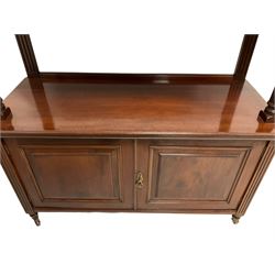 Maple & Co - Early 20th century mahogany buffet side board, the raised back with brass plaque over one shelf, raised on turned and reeded columns to base with two panelled doors, opening to reveal one fixed shelf, raised on ceramic castors
