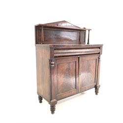 Early 19th century mahogany chiffonier side cabinet, the raised arched back with open shelf over cushion frieze drawer and two panelled cupboards, raised on turned supports W106cm, H131cm, D44cm