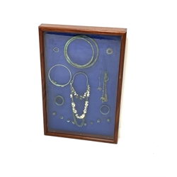 Set of Viking high status ladies personal jewellery mounted in a mahogany glazed display case, 61cm x 91cm