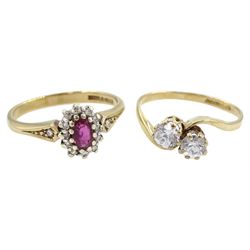 Gold diamond and pink stone cluster ring and a gold two stone cubic zirconia crossover ring, both hallmarked 9ct