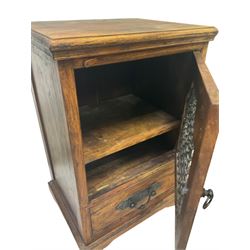 Hardwood cabinet, the projecting top over one cupboard door, opening to revel one shelf and one drawer, raised on bracket supports 